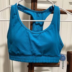 NWT Marika Shirley sports bra in blue color. Size small.